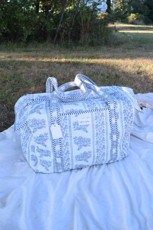 SKY BLUE FLORAL DUFFLE